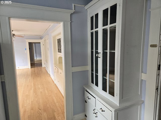2083 Northwest Johnson Street, Unit 5 Portland, OR 97209 - Photo 5 of 15 a view of a hallway with wooden floor and entryway