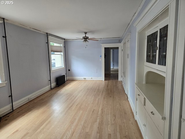 2083 Northwest Johnson Street, Unit 5 Portland, OR 97209 - Photo 6 of 15 wooden floor in an empty room with a window
