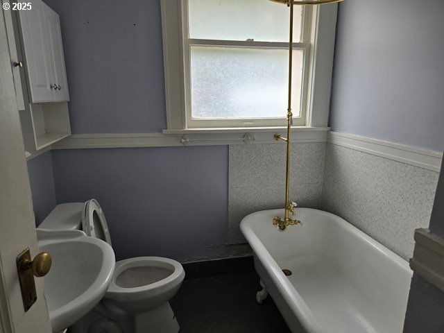 2083 Northwest Johnson Street, Unit 5 Portland, OR 97209 - Photo 10 of 15 a bathroom with a sink and a toilet
