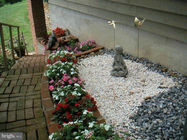 14228 Back Creek Valley Road Hedgesville, WV 25427 - Photo 22 of 30 Multiple brick pathways gardens CAC