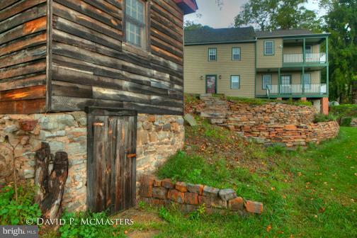 14228 Back Creek Valley Road Hedgesville, WV 25427 - Photo 27 of 30 Smokehouse foreground