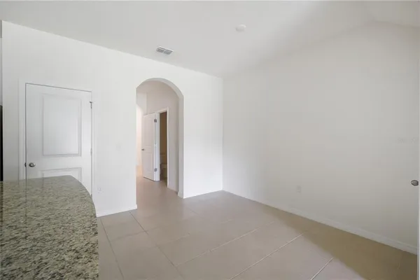 a view of a room with an empty space