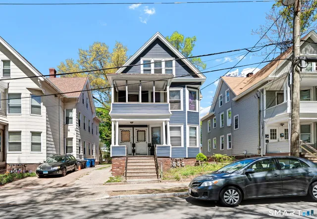 a car parked in front of a building