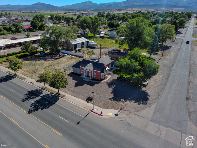 410 North Main Street Beaver, UT 84713 - Photo 24 of 31 View from above of property with a mountain backdrop