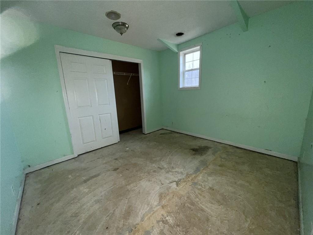 747 Forever Lane Ligonier, PA 15658 - Photo 14 of 23 an empty room with windows