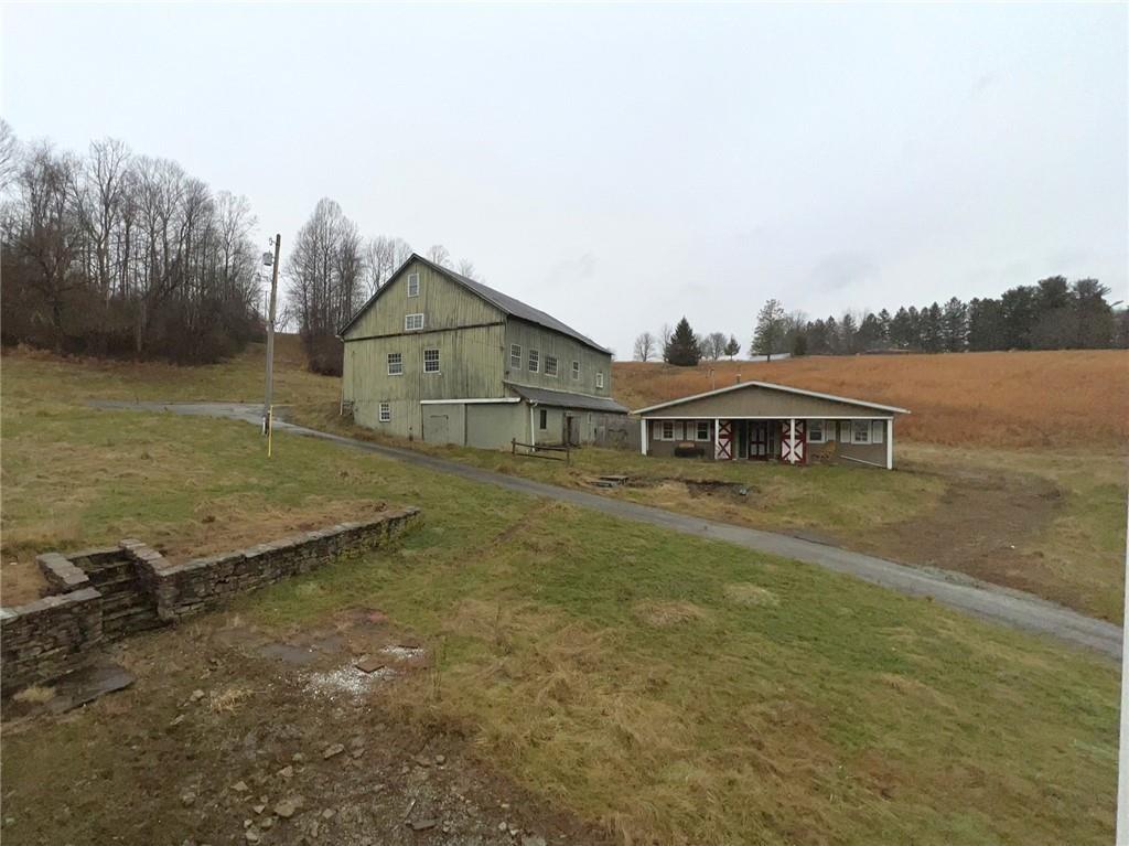 747 Forever Lane Ligonier, PA 15658 - Photo 20 of 23 a front view of a house with a yard