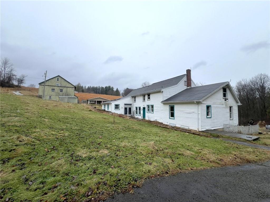 747 Forever Lane Ligonier, PA 15658 - Photo 5 of 23 a view of a house with a yard
