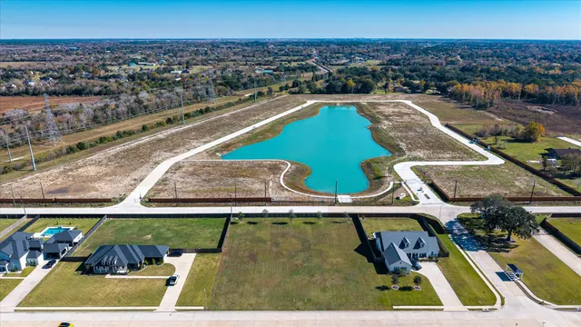 an aerial view of a swimming pool and outdoor space