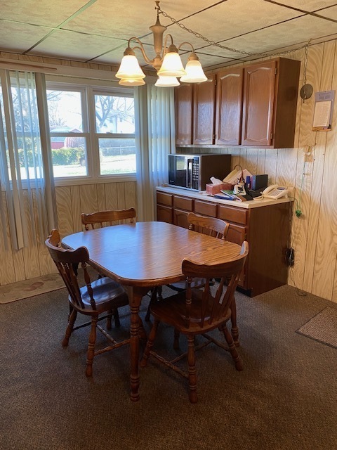 206 North 4th Street Danforth, IL 60930 - Photo 17 of 18 a dining room with a wooden table and chairs