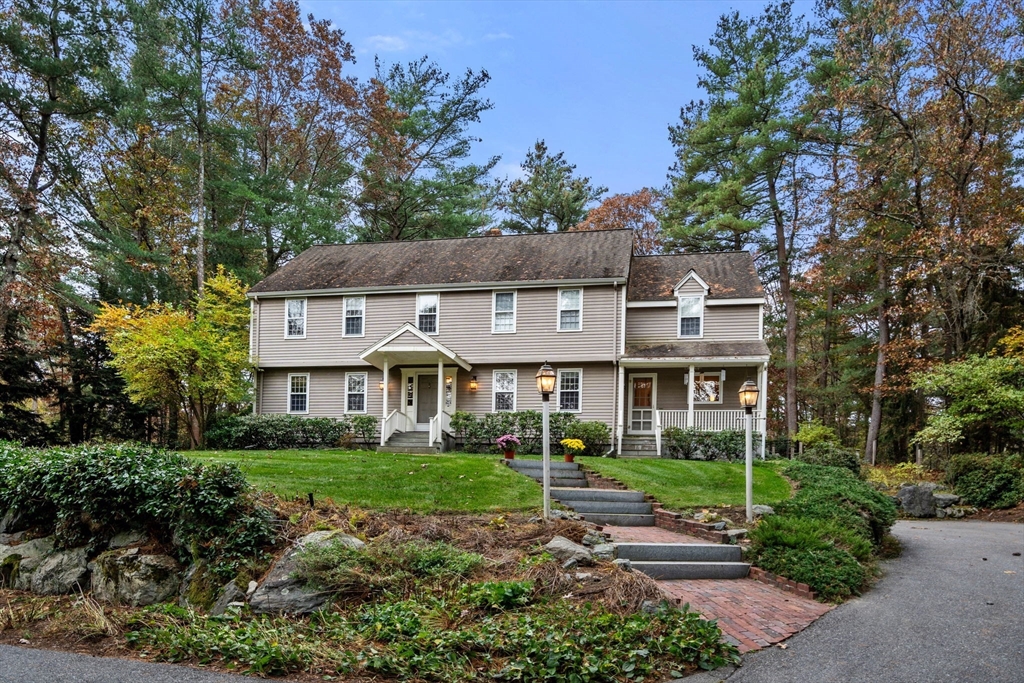 15 Bradyll Road Weston, MA 02493 - Photo 1 of 36 a front view of a house with a garden