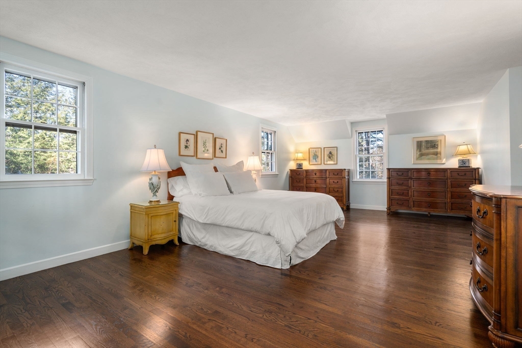 15 Bradyll Road Weston, MA 02493 - Photo 22 of 36 a bedroom with a bed and a view of kitchen