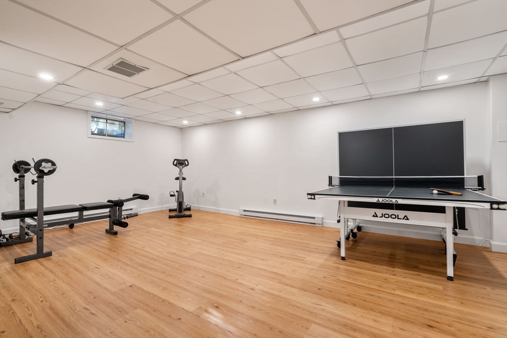 15 Bradyll Road Weston, MA 02493 - Photo 32 of 36 a view of a room with gym equipment