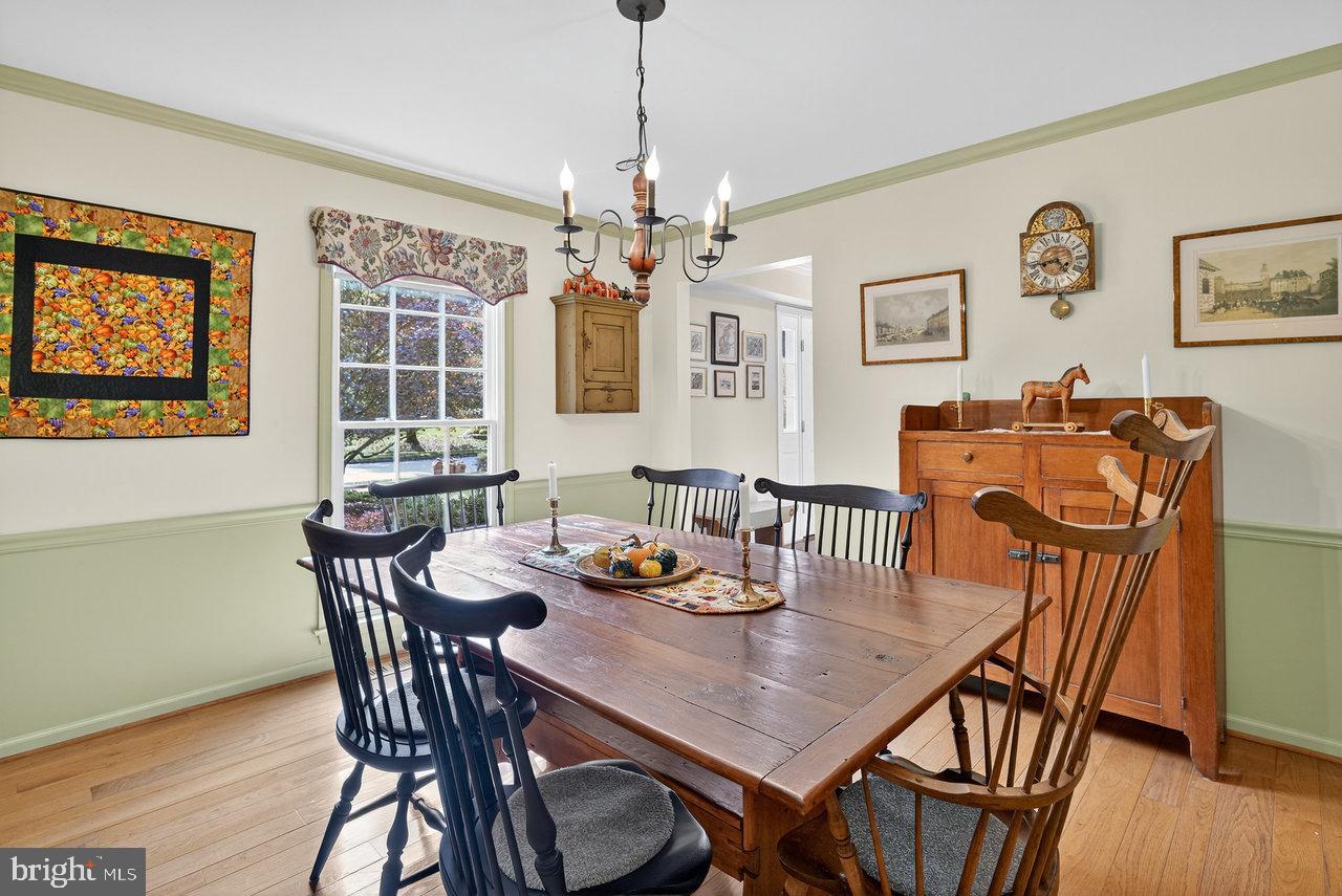 4 Locke Court Ewing, NJ 08628 - Photo 11 of 43 a view of a dining room with furniture window and wooden floor