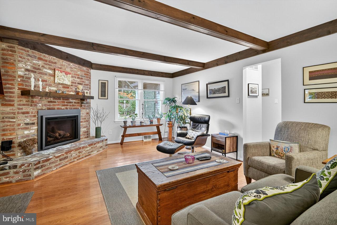 4 Locke Court Ewing, NJ 08628 - Photo 14 of 43 a living room with furniture and a fireplace
