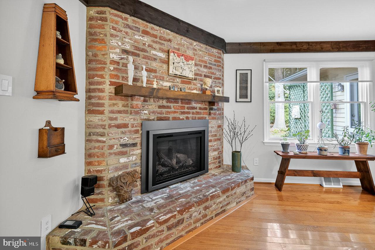 4 Locke Court Ewing, NJ 08628 - Photo 15 of 43 a living room with furniture and a fireplace