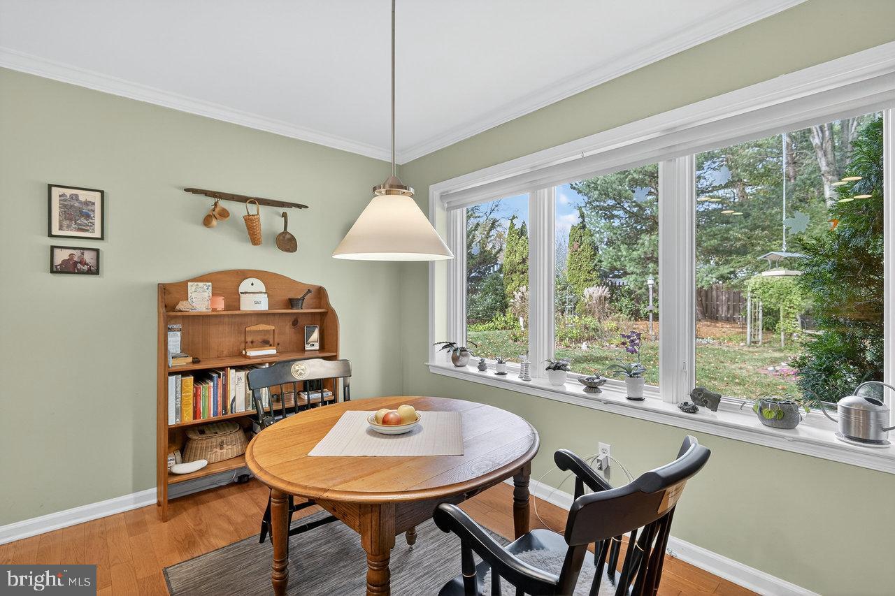 4 Locke Court Ewing, NJ 08628 - Photo 20 of 43 a view of a dining room with furniture window and wooden floor