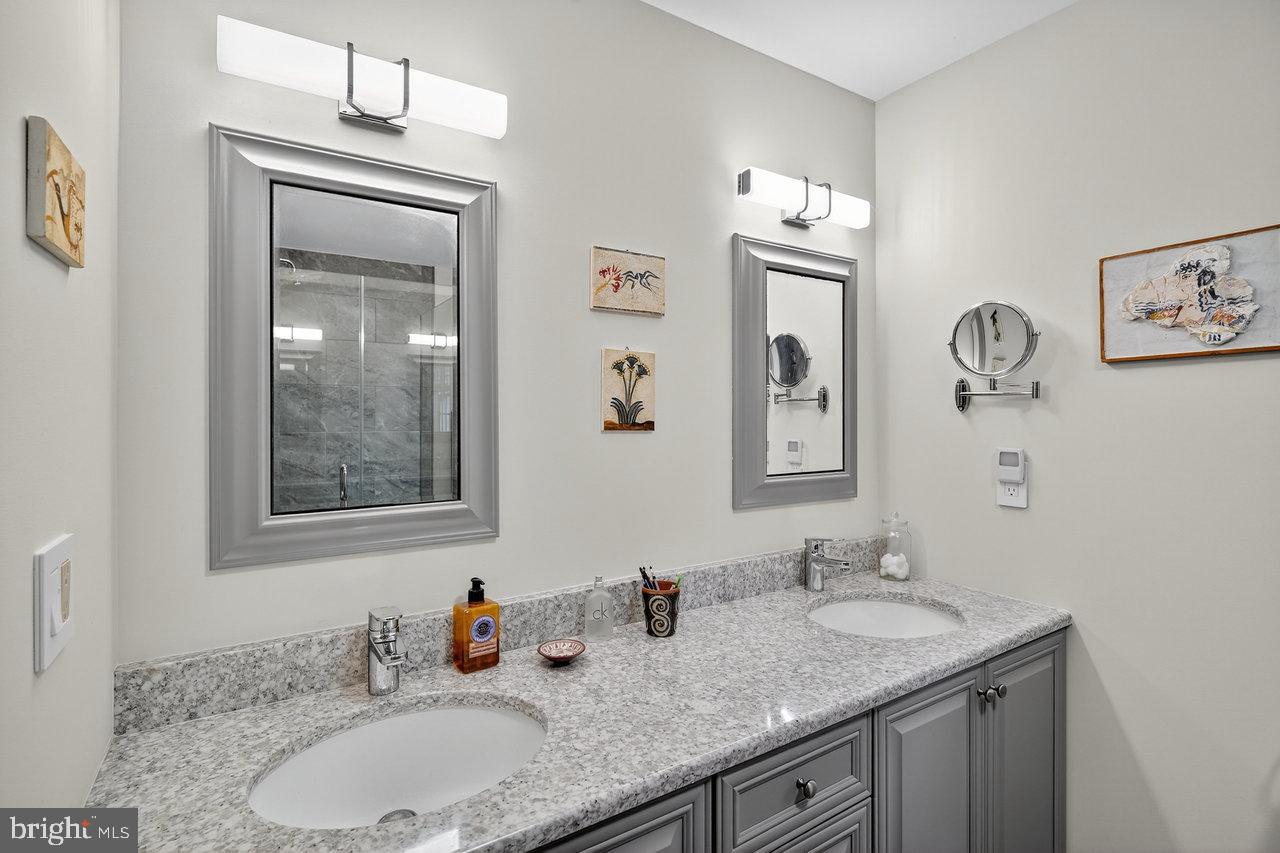 4 Locke Court Ewing, NJ 08628 - Photo 28 of 43 a bathroom with a granite countertop sink vanity and mirror