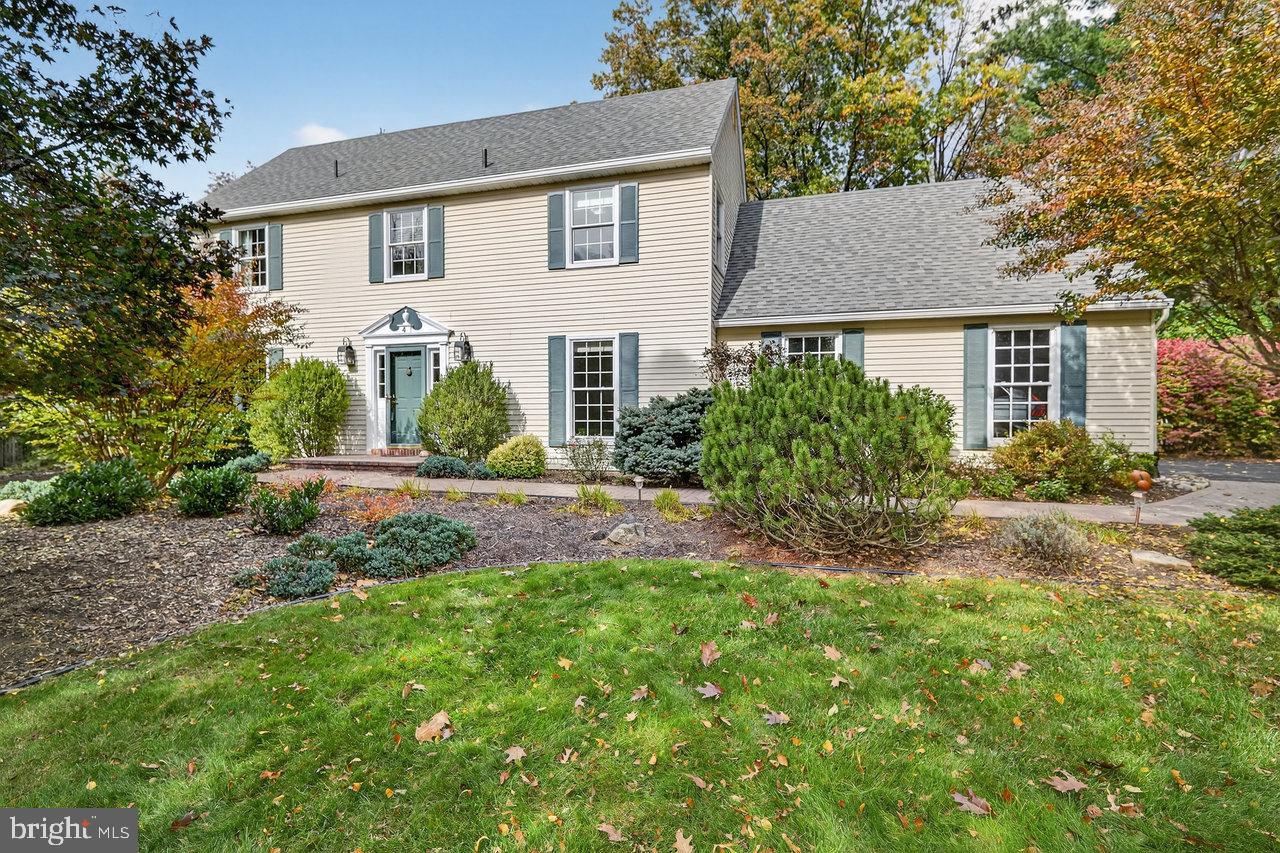 4 Locke Court Ewing, NJ 08628 - Photo 3 of 43 a front view of a house with garden
