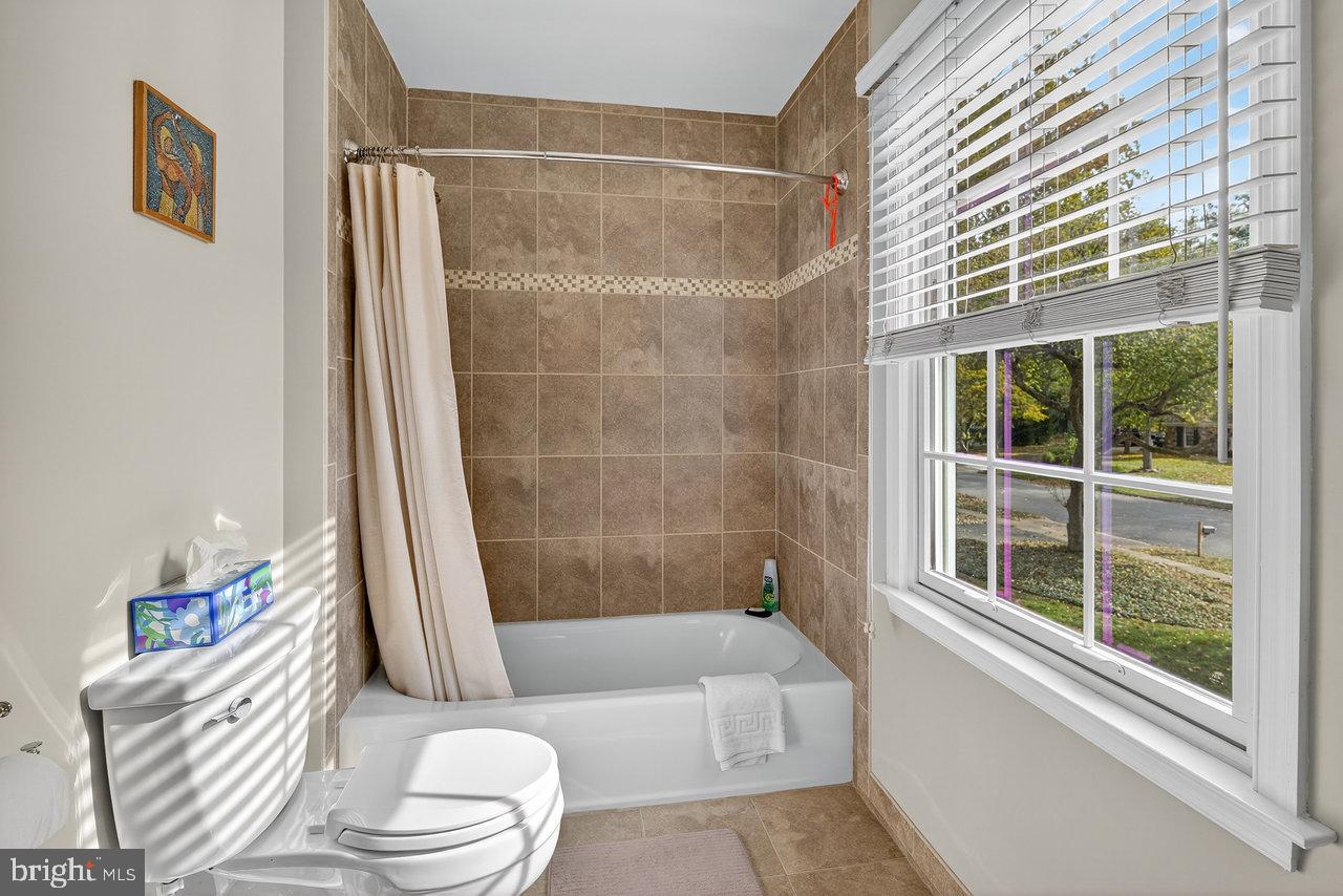 4 Locke Court Ewing, NJ 08628 - Photo 34 of 43 a bathroom with a sink toilet and shower