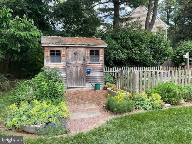 4 Locke Court Ewing, NJ 08628 - Photo 43 of 43 a front view of a house with a yard