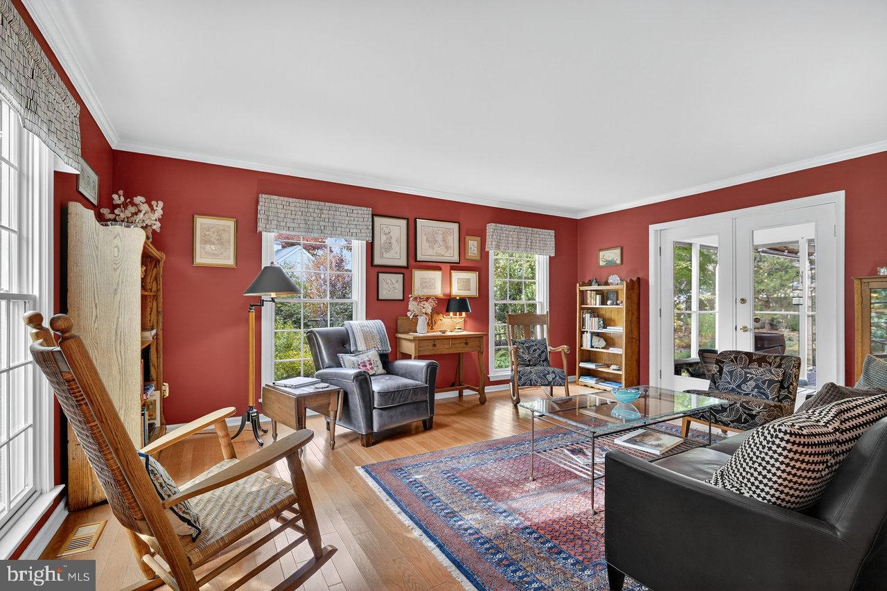 4 Locke Court Ewing, NJ 08628 - Photo 8 of 43 a living room with furniture and a floor to ceiling window