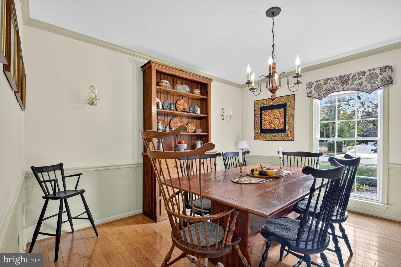 4 Locke Court Ewing, NJ 08628 - Photo 10 of 43 a view of a dining room with furniture window and wooden floor