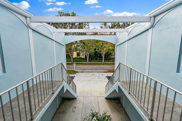 a view of balcony with furniture