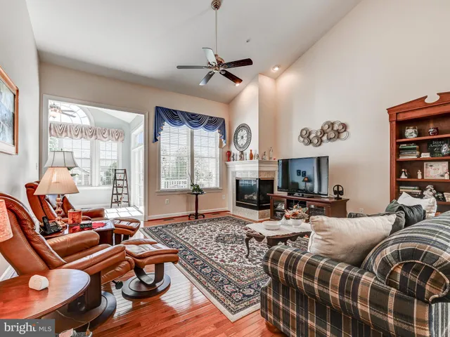 a living room with lots of furniture and rug