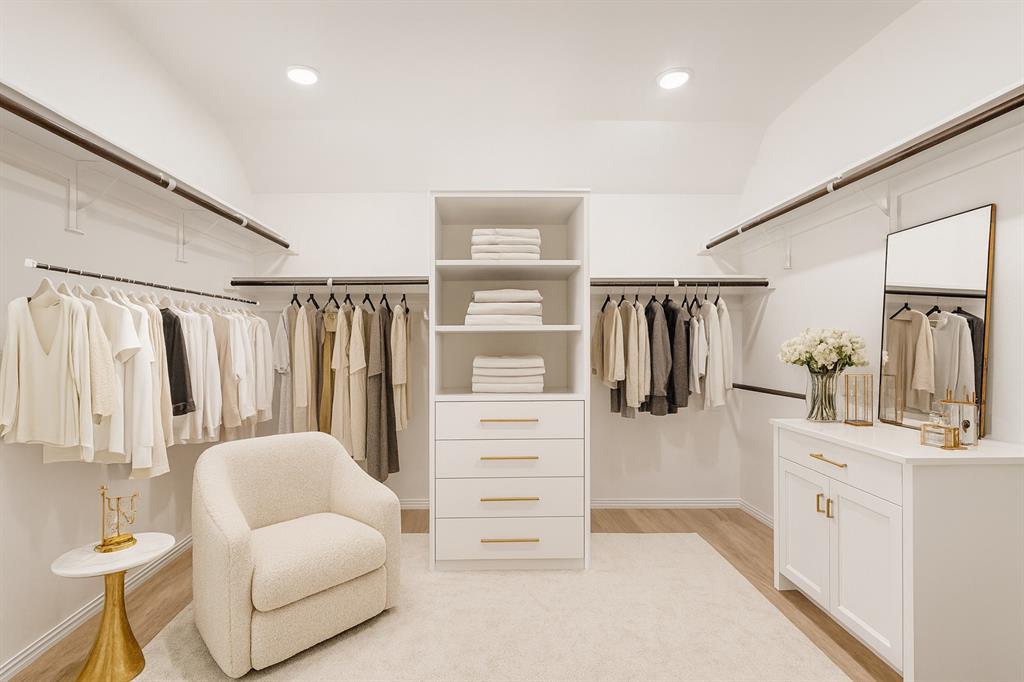 1336 Morning View Road Georgetown, TX 78628 - Photo 17 of 40 Customizable storage solutions define this well-appointed closet, offering both hanging space and built-in shelving.