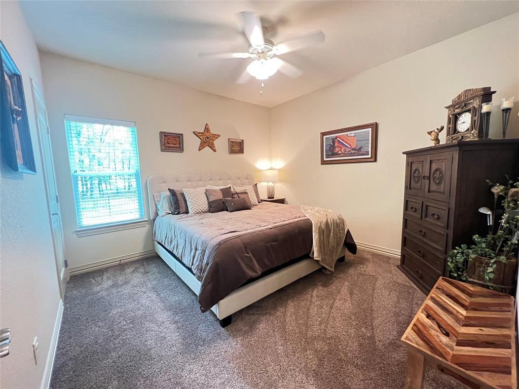 187 Private Road 5987 Yantis, TX 75497 - Photo 14 of 40 Carpeted bedroom featuring ceiling fan