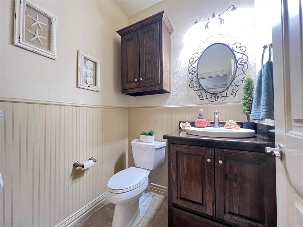 187 Private Road 5987 Yantis, TX 75497 - Photo 18 of 40 Bathroom with tile flooring, vanity, and toilet