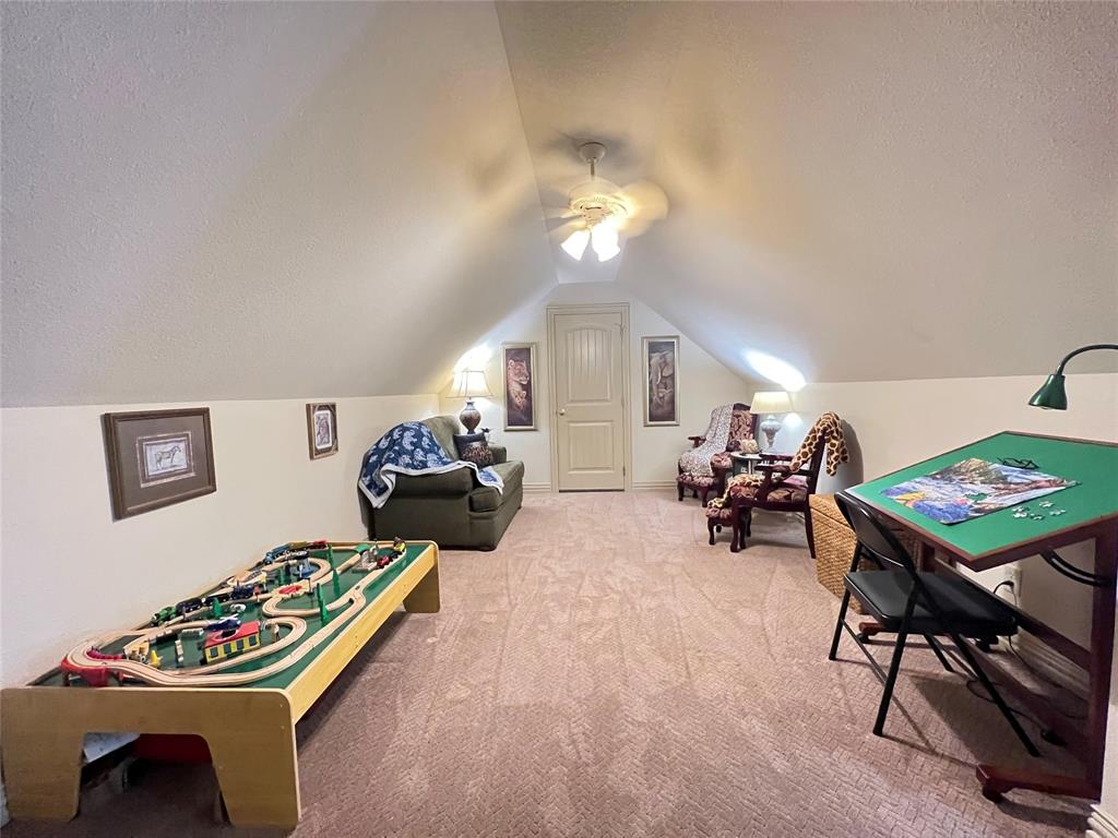 187 Private Road 5987 Yantis, TX 75497 - Photo 26 of 40 Game room with ceiling fan, carpet floors, and lofted ceiling