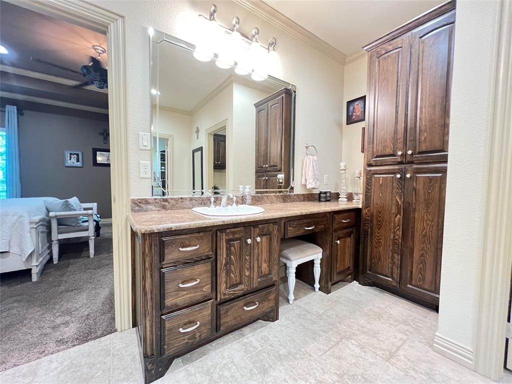 187 Private Road 5987 Yantis, TX 75497 - Photo 31 of 40 Bathroom featuring tile flooring, ornamental molding, and vanity