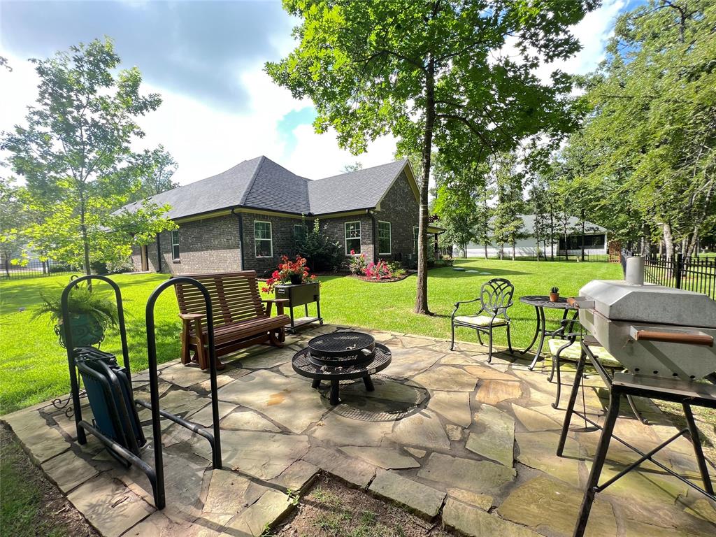 187 Private Road 5987 Yantis, TX 75497 - Photo 36 of 40 View of terrace with an outdoor fire pit