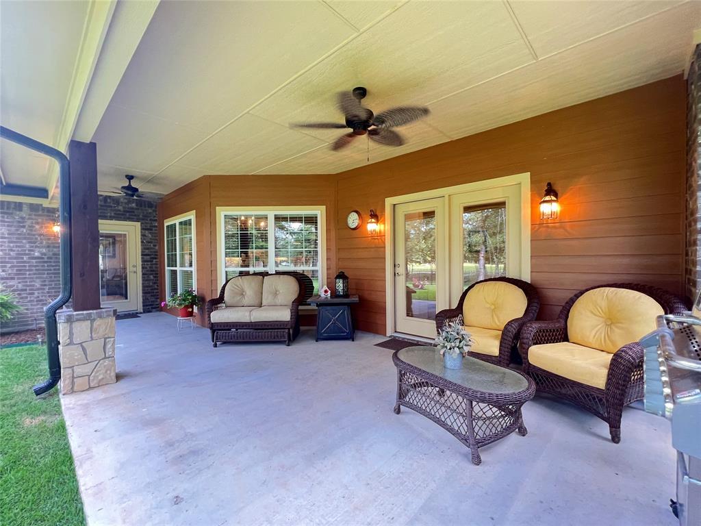 187 Private Road 5987 Yantis, TX 75497 - Photo 39 of 40 View of patio featuring an outdoor living space and ceiling fan