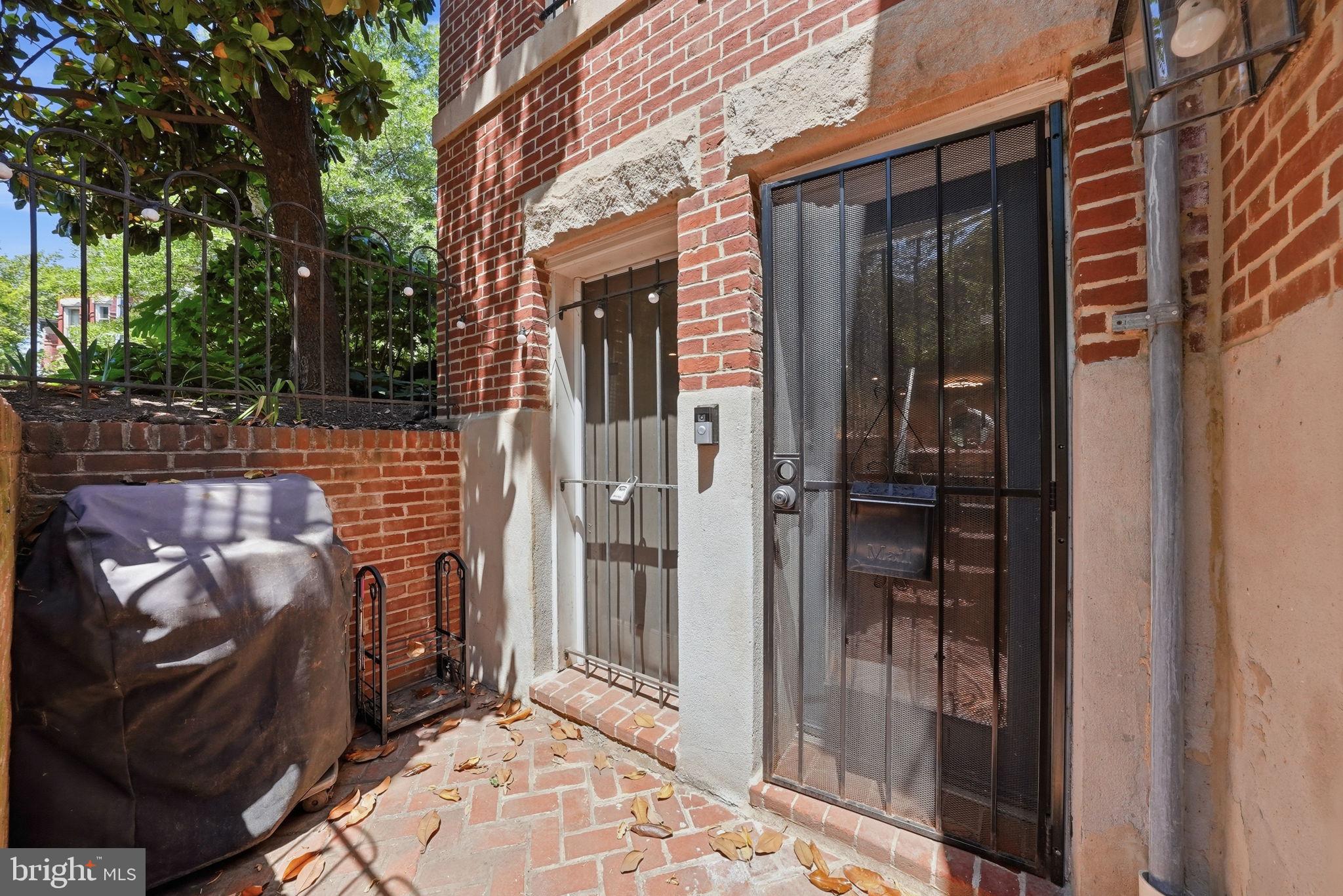 1200 East Capitol Street Northeast, Unit 1 Washington, DC 20002 - Photo 29 of 31 a view of a wooden door and a outdoor space