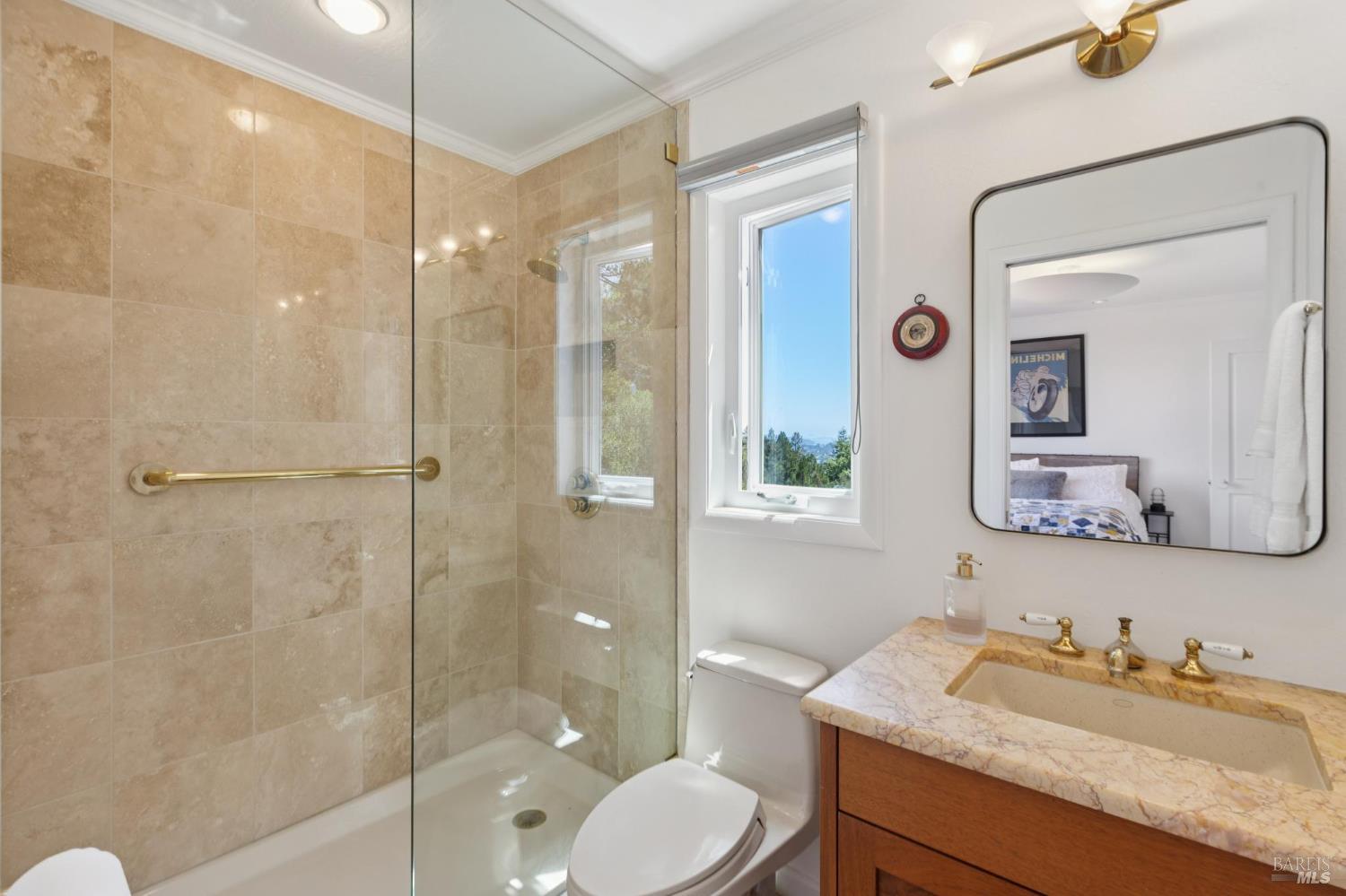 222 Marguerite Avenue Mill Valley, CA 94941 - Photo 48 of 59 a bathroom with a granite countertop sink toilet and shower