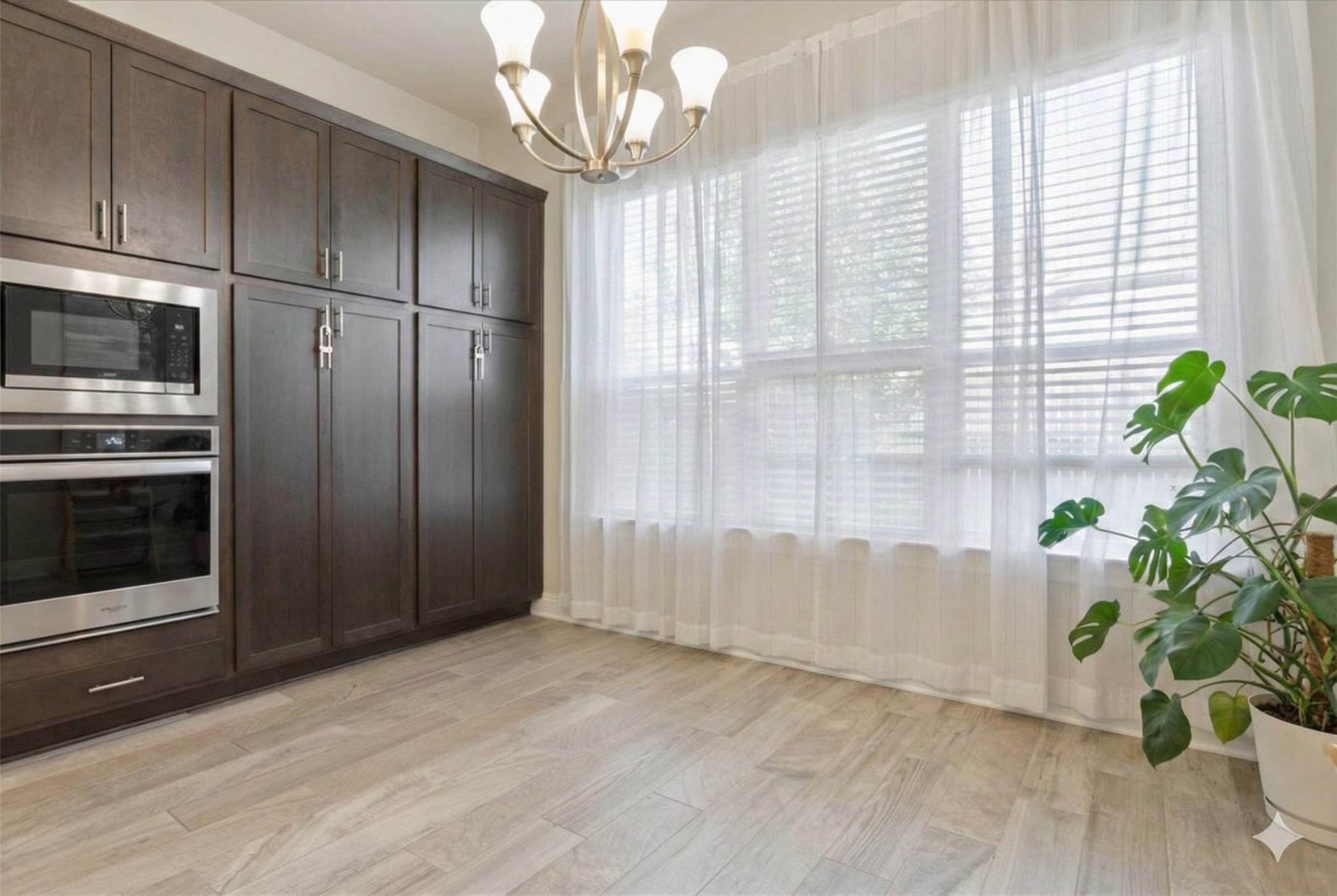 3814 Chance Loop Round Rock, TX 78628 - Photo 6 of 16 Unfurnished dining area featuring a chandelier and light wood-style flooring