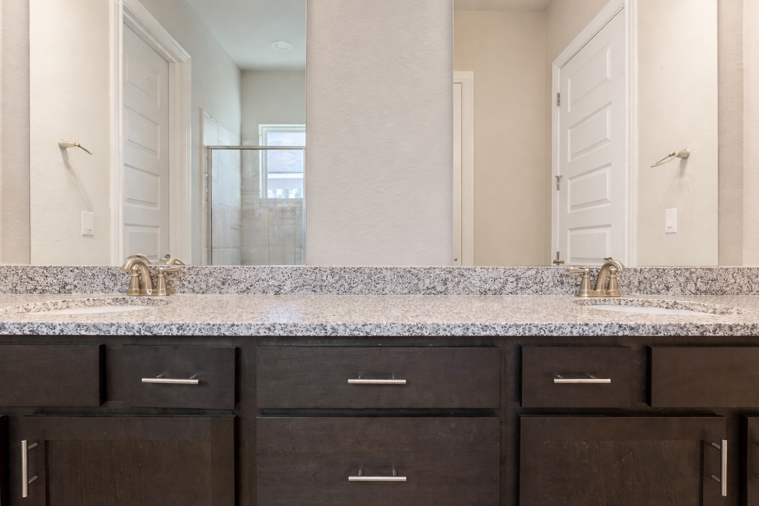 3814 Chance Loop Round Rock, TX 78628 - Photo 10 of 16 Full bath with double vanity and a shower stall