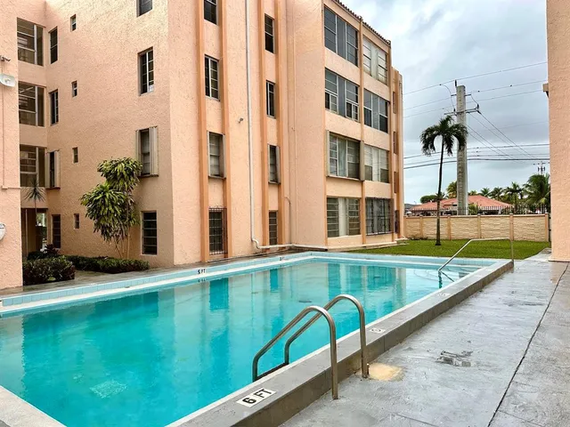 swimming pool view with a outdoor space