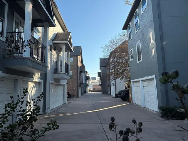 a view of a street with cars