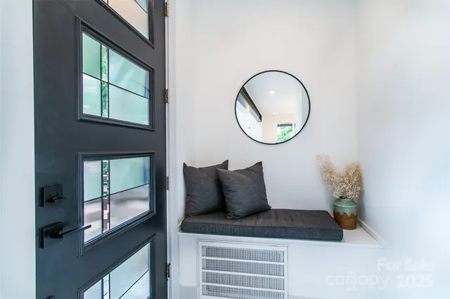 a view of a hallway with washer and dryer