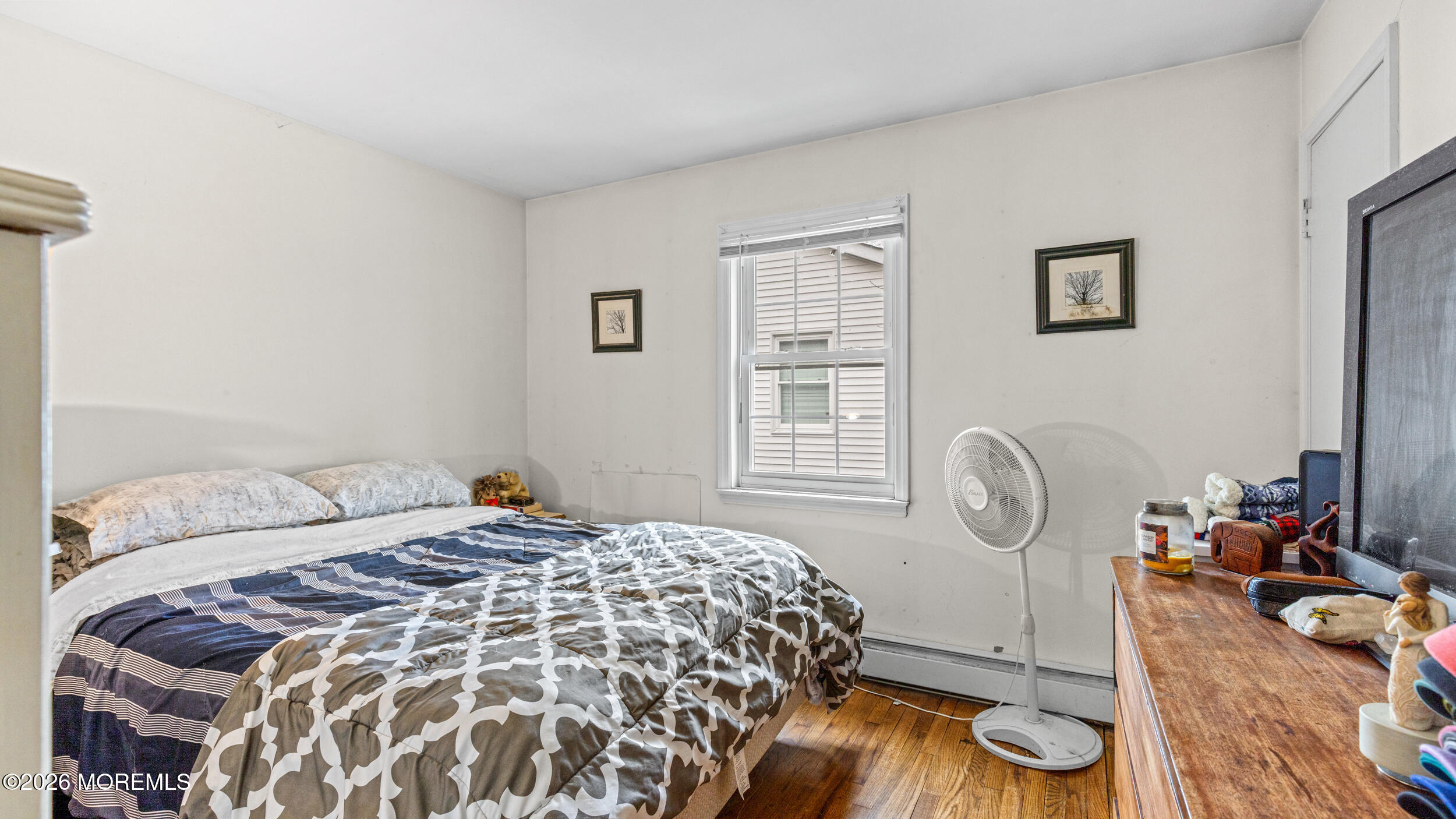 Bay Ave Point Point Pleasant, NJ 08742 - Photo 17 of 34 a bedroom with a bed and a window
