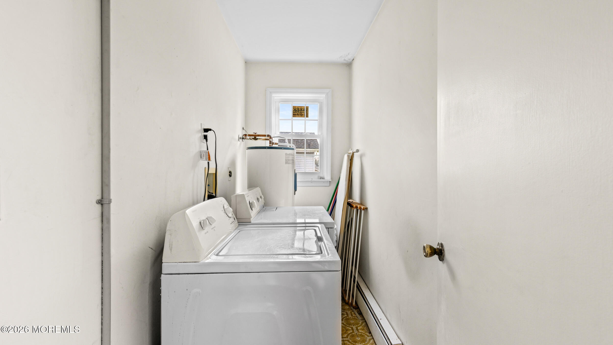 Bay Ave Point Point Pleasant, NJ 08742 - Photo 20 of 34 a view of a room with washer and dryer