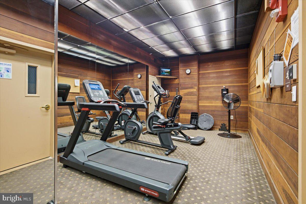 700 7th Street Southwest, Unit 827 Washington, DC 20024 - Photo 31 of 32 Modern fitness space with wooden accents.