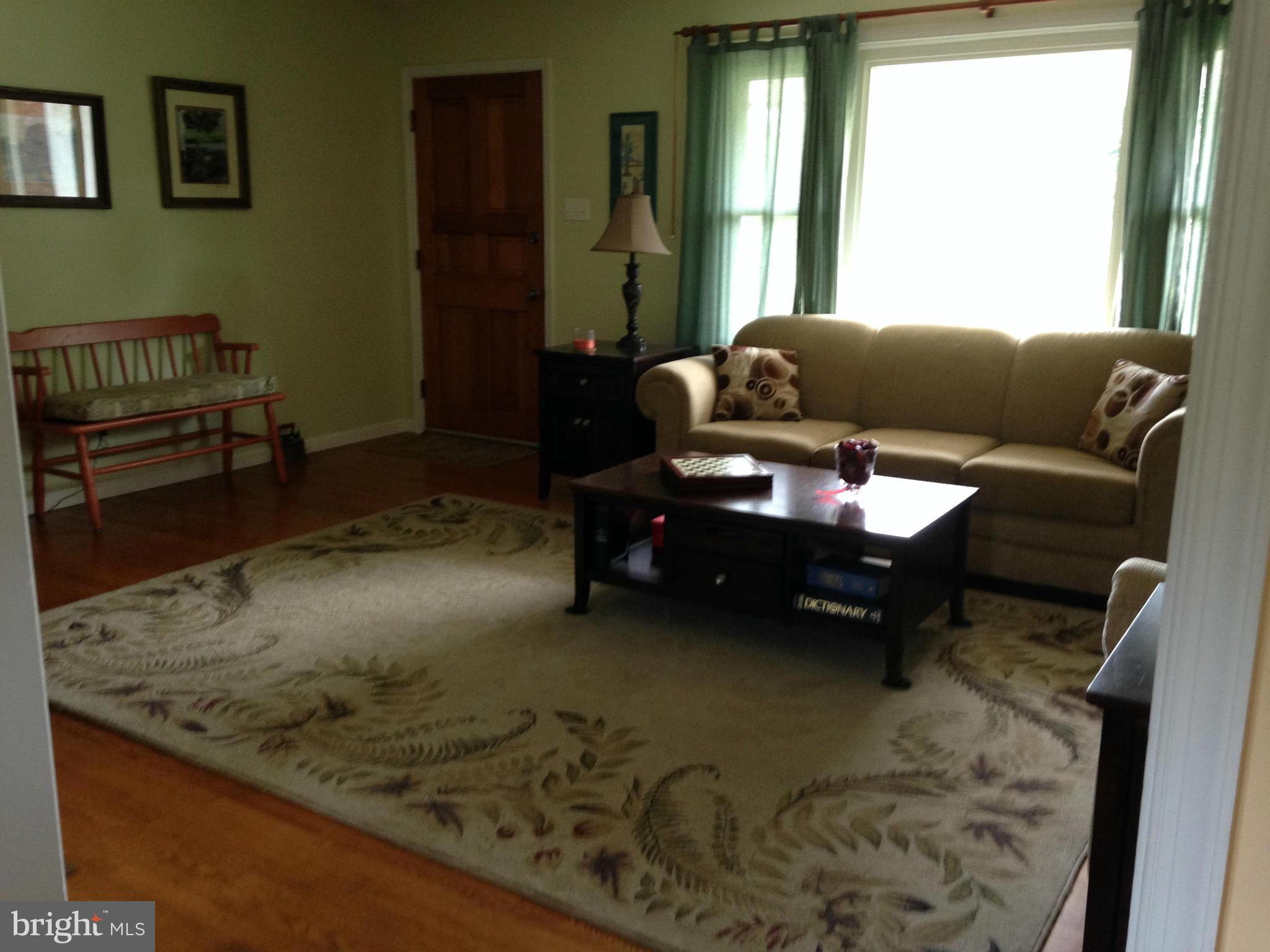 1355 Jewell Road Dunkirk, MD 20754 - Photo 11 of 30 a living room with furniture and a rug