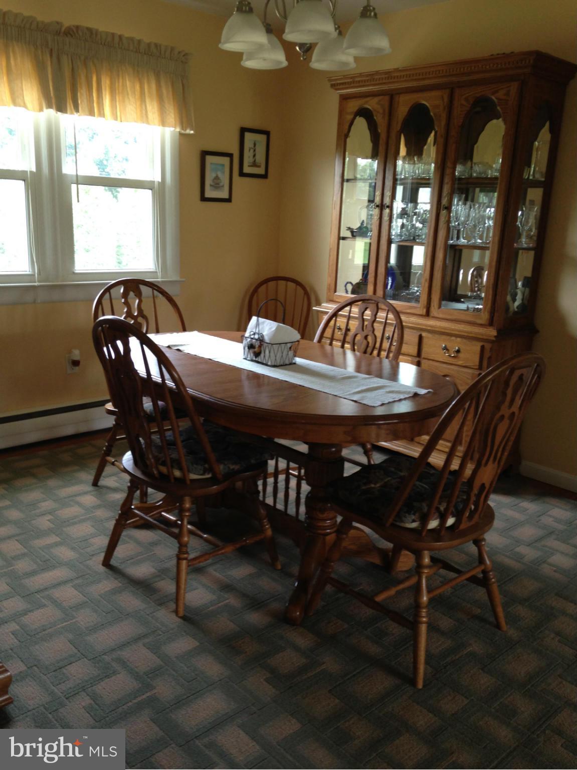 1355 Jewell Road Dunkirk, MD 20754 - Photo 12 of 30 a view of a dining room with furniture and window