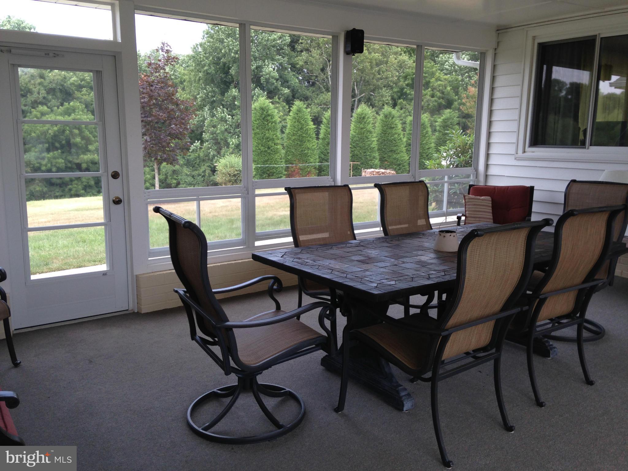 1355 Jewell Road Dunkirk, MD 20754 - Photo 14 of 30 a view of a dining room with furniture window and outside view