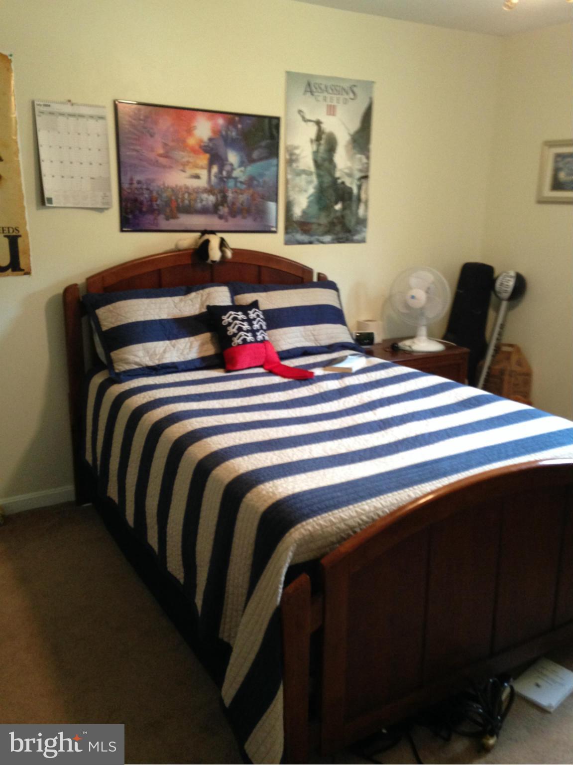 1355 Jewell Road Dunkirk, MD 20754 - Photo 20 of 30 a bedroom with a bed and painting on the wall