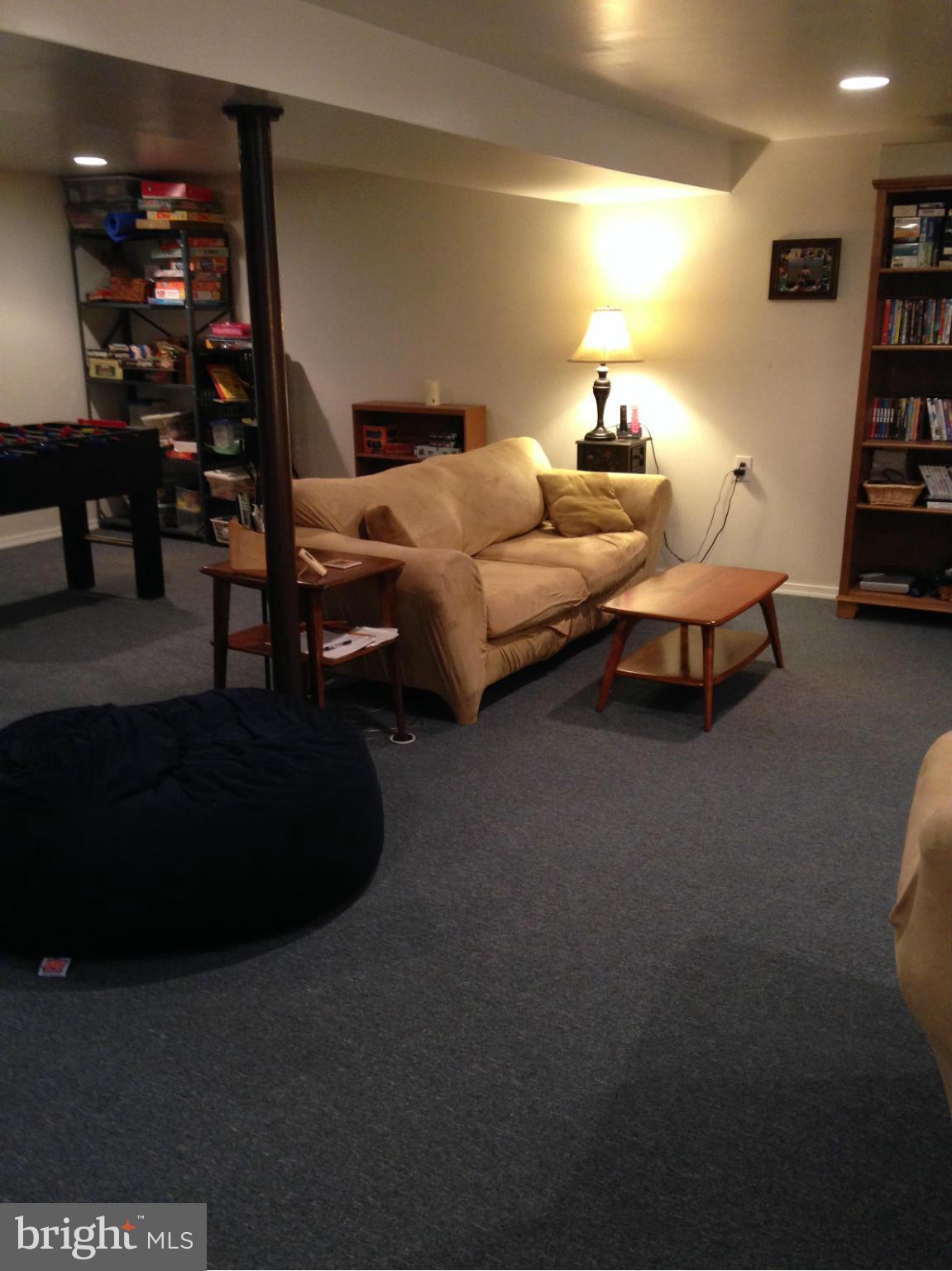 1355 Jewell Road Dunkirk, MD 20754 - Photo 26 of 30 a bedroom with furniture and a book shelf